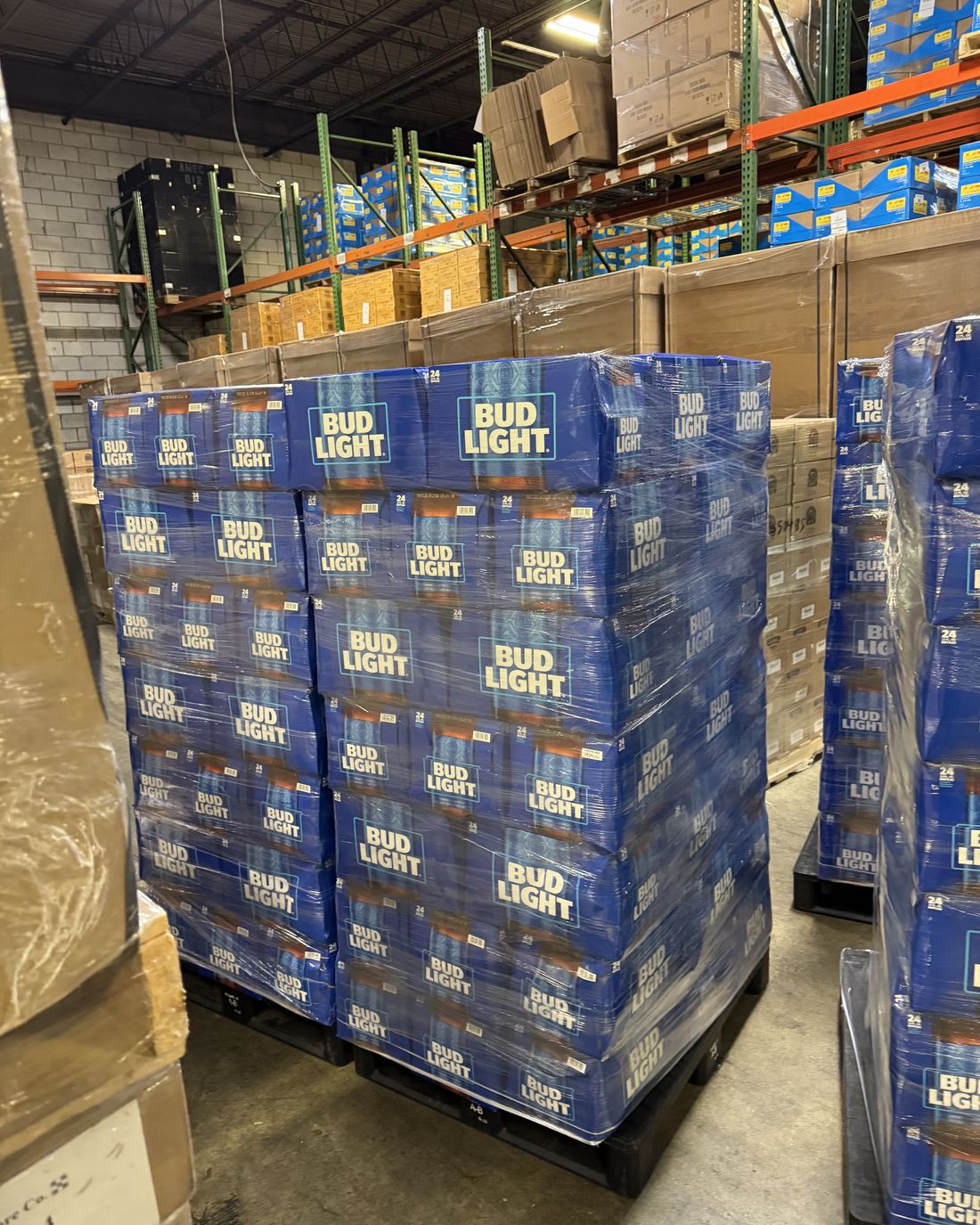 The same freight rebuilt into two square, tightly wrapped pallets standing straight