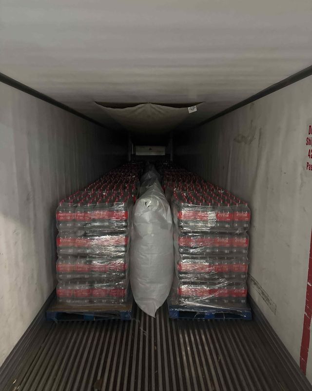 Freight loaded in a trailer with a dunnage air bag set between two pallets to stop them shifting